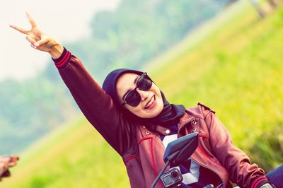 Portrait of a young woman using mobile phone