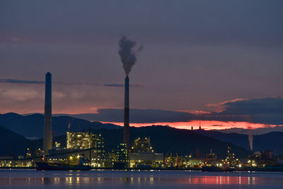 Illuminated city at twilight