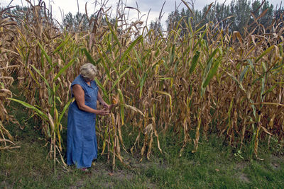 Woman standing in field