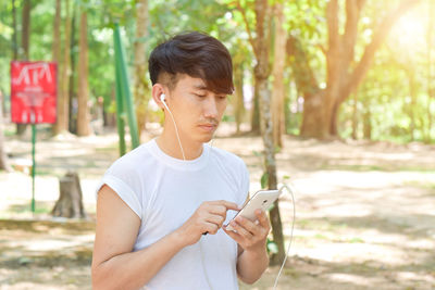 Young man using mobile phone
