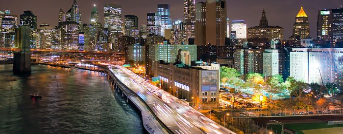 Illuminated buildings in city at night