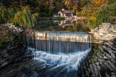 View of dam on riverbank