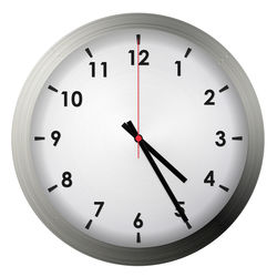 Close-up of clock over white background
