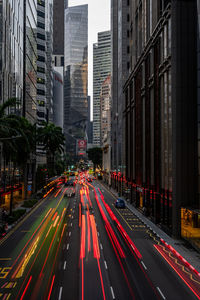 High angle view of light trails on road at night