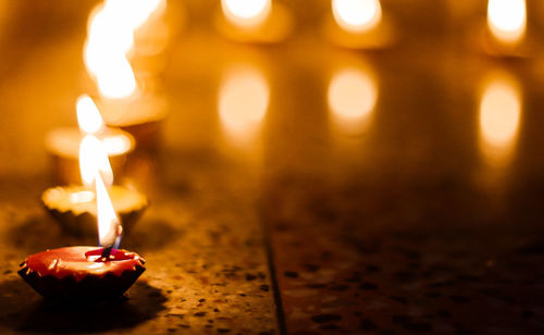 Close-up of lit candles