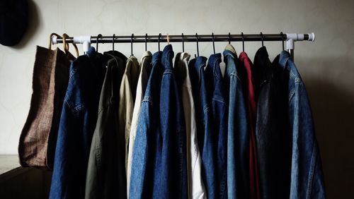 Close-up of clothes hanging at home