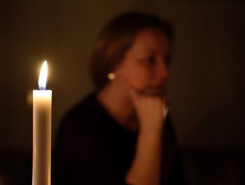 Close-up of lit candle