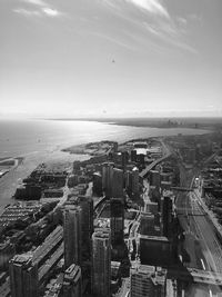 High angle view of buildings in city against sky