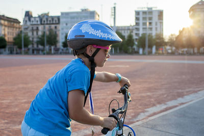 Man riding bicycle on road
