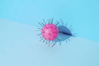 Close-up of a virus on blue background