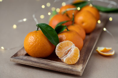 Close-up of orange fruits on table