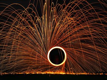 Spinning wire wool at night