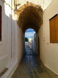 Narrow alley with buildings in background