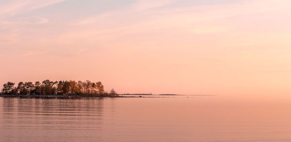 Scenic view of sea at sunset