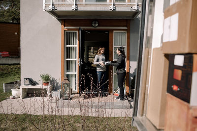 People standing in front of building