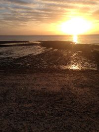 Scenic view of sunset over sea