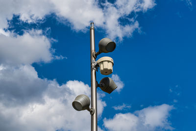 Low angle view of street light against sky