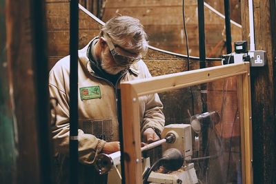 Man working on wood