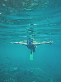 Man swimming in sea