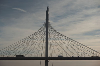 Span of a transport cable-stayed bridge. cars drive over the bridge. transport and logistics topics