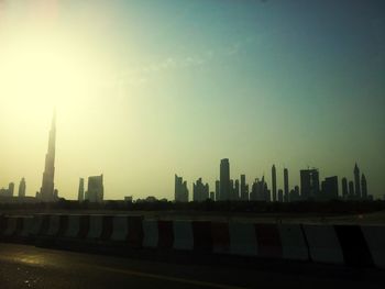 View of buildings in city against clear sky