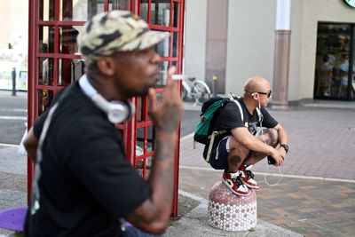 Men at footpath in city