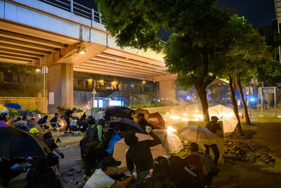 People on street at night