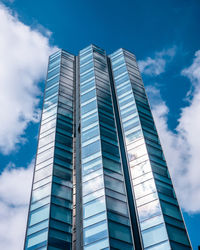 Low angle view of modern buildings against sky