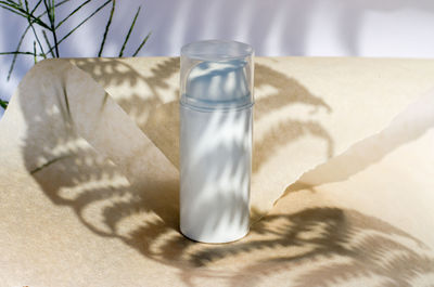 High angle view of drinking glass on table