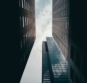 Low angle view of office building against sky