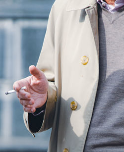 Close-up of man holding hands