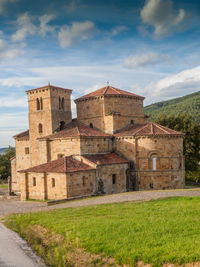 Historic building against cloudy sky