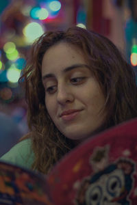 Portrait of smiling young woman at restaurant