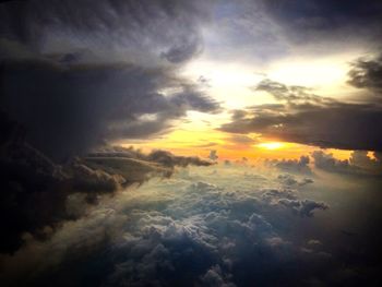 Scenic view of landscape against cloudy sky