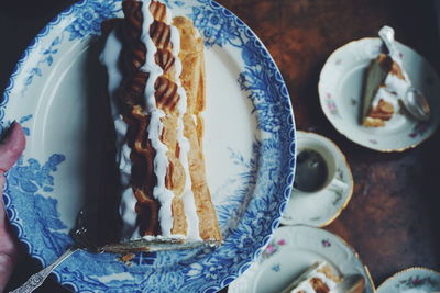 High angle view of cake in plate at table