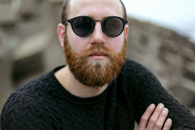 Portrait of young man wearing sunglasses