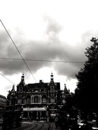 Low angle view of road against cloudy sky