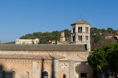 View of historic building against clear blue sky