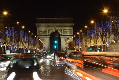 Light trails on city street at night