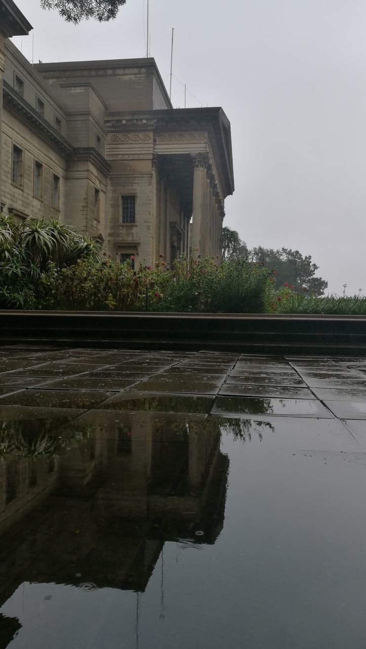 FOUNTAIN IN FRONT OF BUILDING