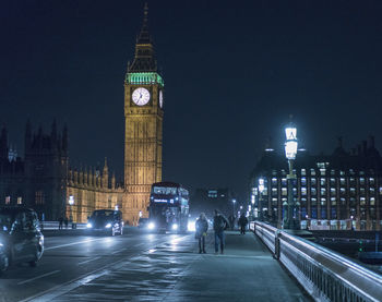 Illuminated buildings in city at night