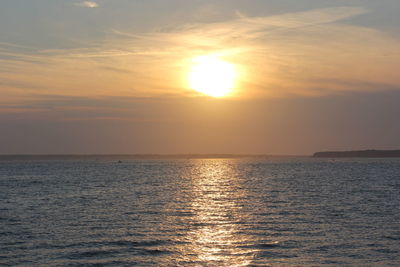 Scenic view of sea at sunset