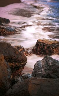 Scenic view of rocky beach