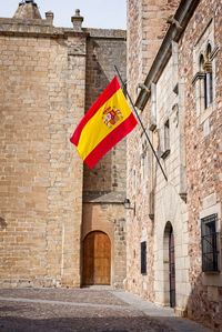 Flag on wall of building