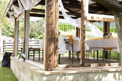Empty chairs and table in park