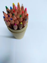 High angle view of multi colored pencils on table