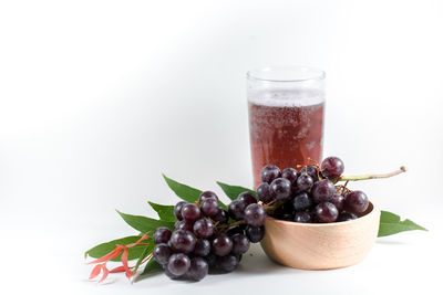 Close-up of fruits against white background