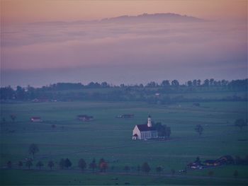 Scenic view of landscape against sky during sunset