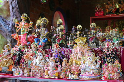 Statues for sale at market stall