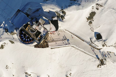 High angle view of snow covered field